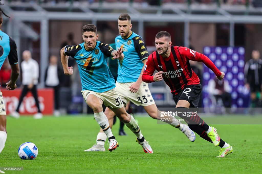GIUSEPPE MEAZZA STADIUM, MILAN, ITALY - 2021/09/22: Ante Rebic of AC Milan and Mattia Calandra of Venezia FC are seen in action during the Serie A 2021/22 football match between AC Milan and Venezia FC at Giuseppe Meazza Stadium in Milan.
(Final score; AC Milan 2:0 Venezia FC). (Photo by Fabrizio Carabelli/SOPA Images/LightRocket via Getty Images)